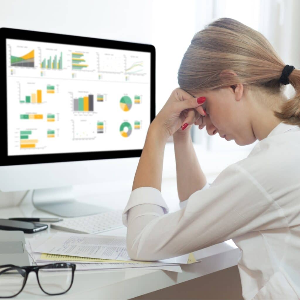 Woman in office preparing for sick leave, representing workplace policies and employee benefits compliance.
